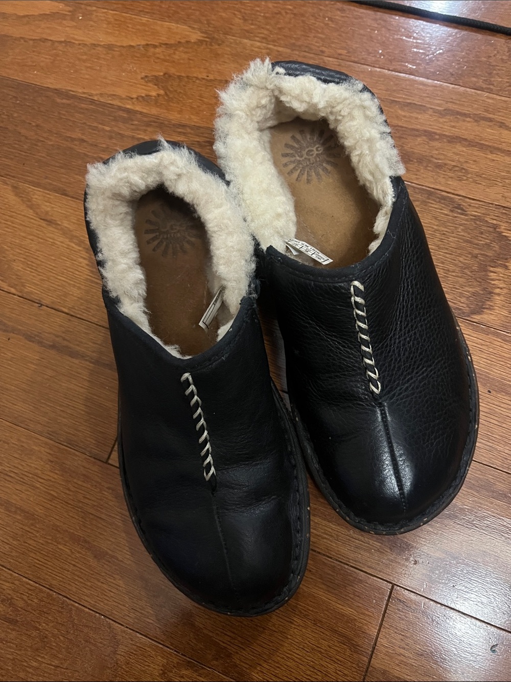 UGG Black Leather Shearling-Lined Slip-On Clogs